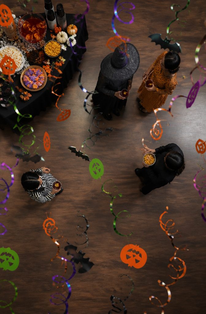 Colorful hanging swirl decorations spinning from the ceiling.
