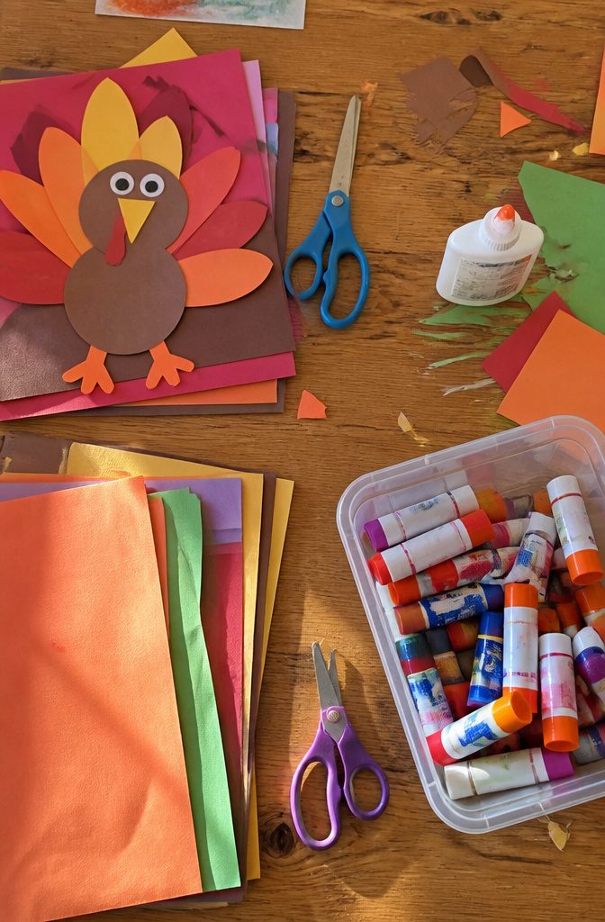 Thanksgiving Turkey Craft Activity Ideas for Kids at Home 10 Materials for turkey crafts including construction paper and glue.